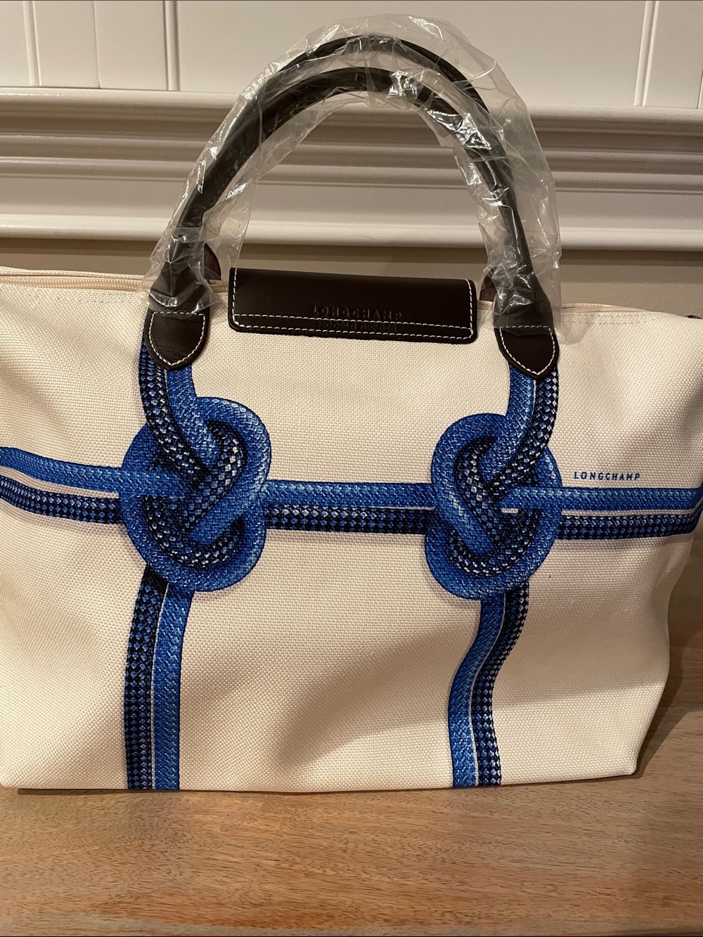 Brand new Longchamp Canvas Tote with Blue Rope Knot Accents and Dark Brown Trim - Picture 2 of 5